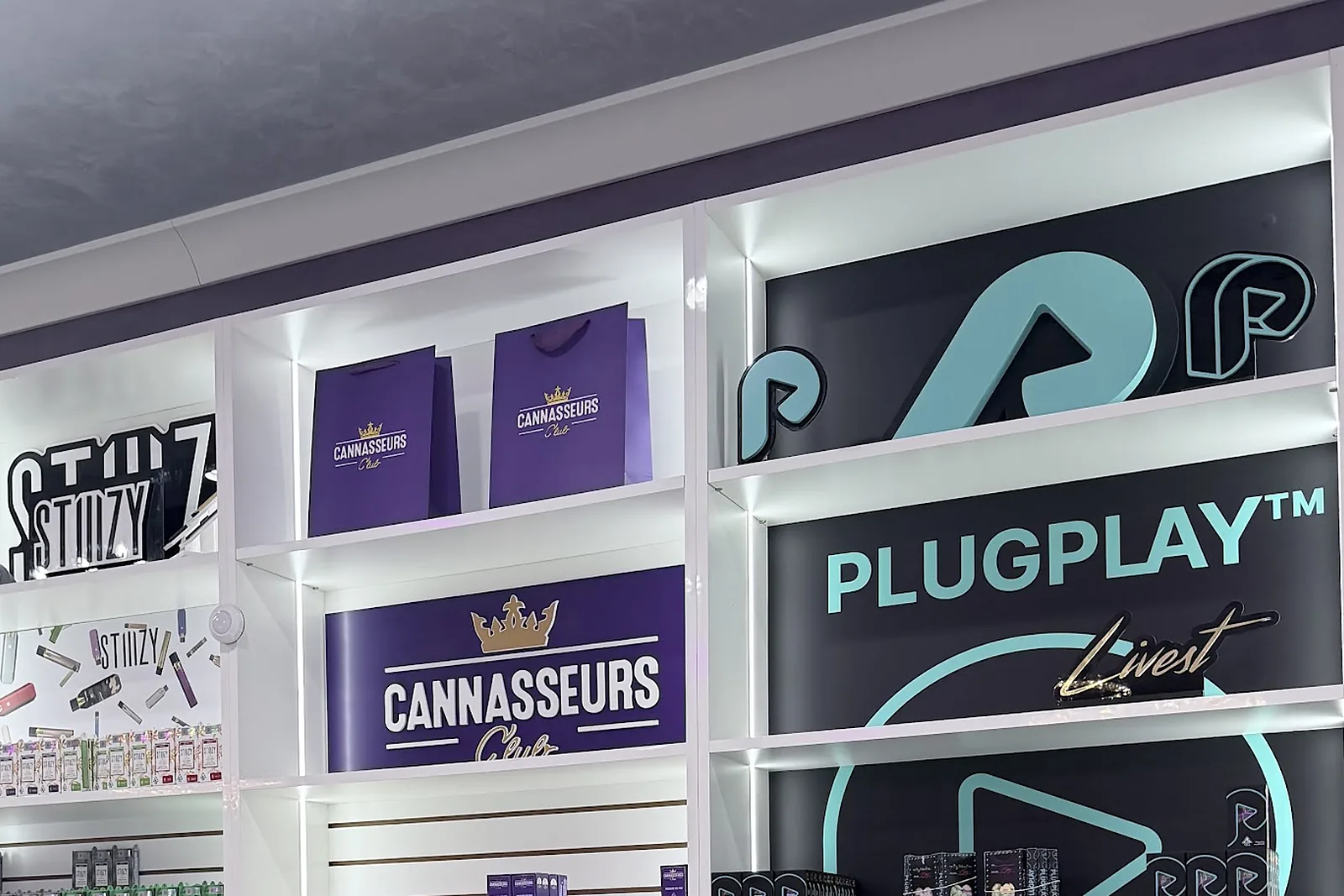 PlugPlay display on the vape wall at Cannasseurs Club in North Hollywood